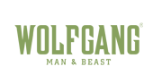 A black background with green letters that say wolfgang man and beast.