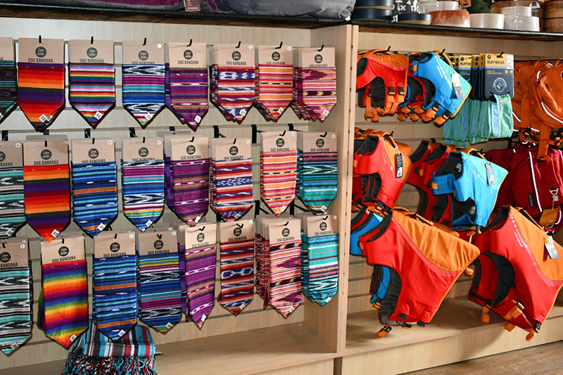 A display of ties and scarves in different colors.
